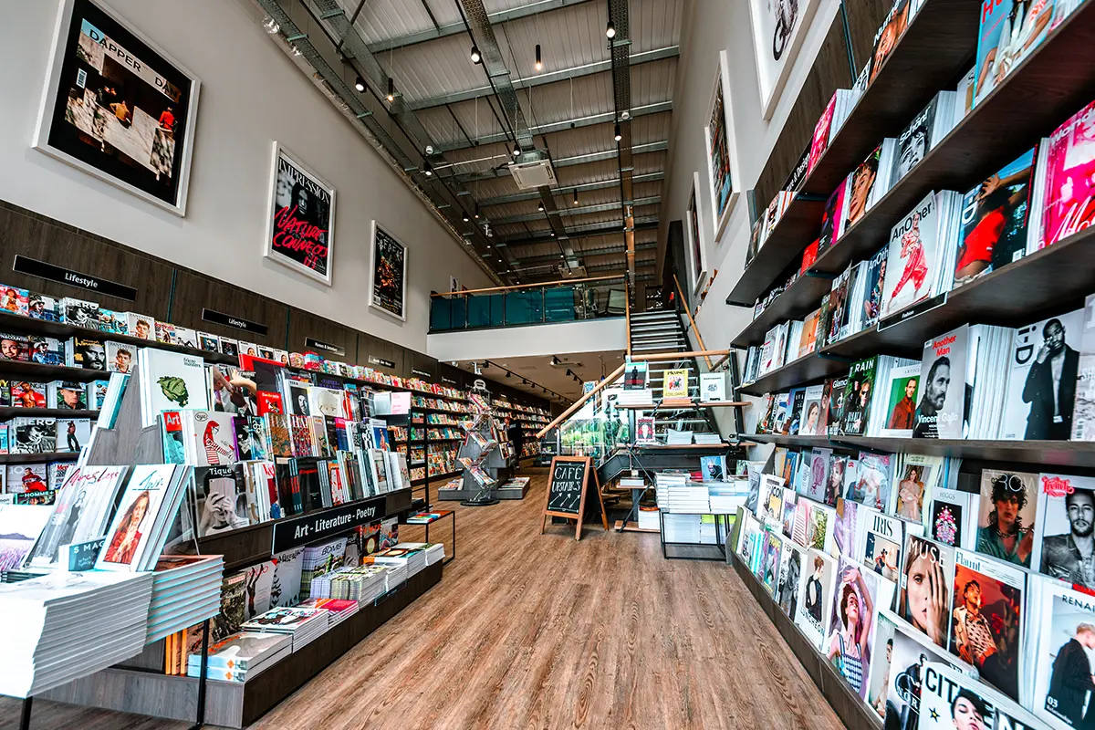 The arrangement of the magazines encourages customers to purchase newfound-magazines on impulse