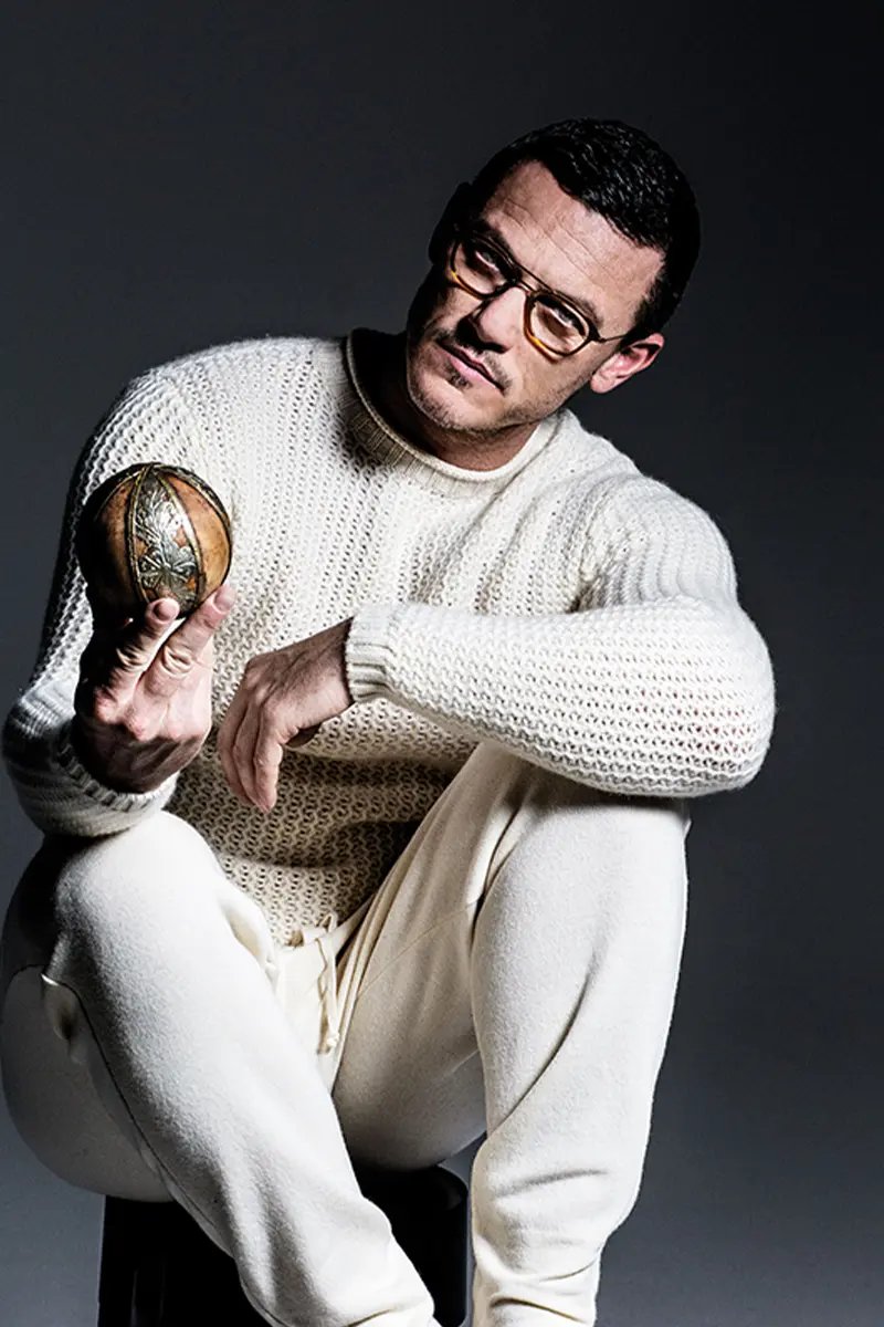 Luke Evans by Avedon, Lampoon Issue 7. Sweater and pants Ralph Lauren Collection