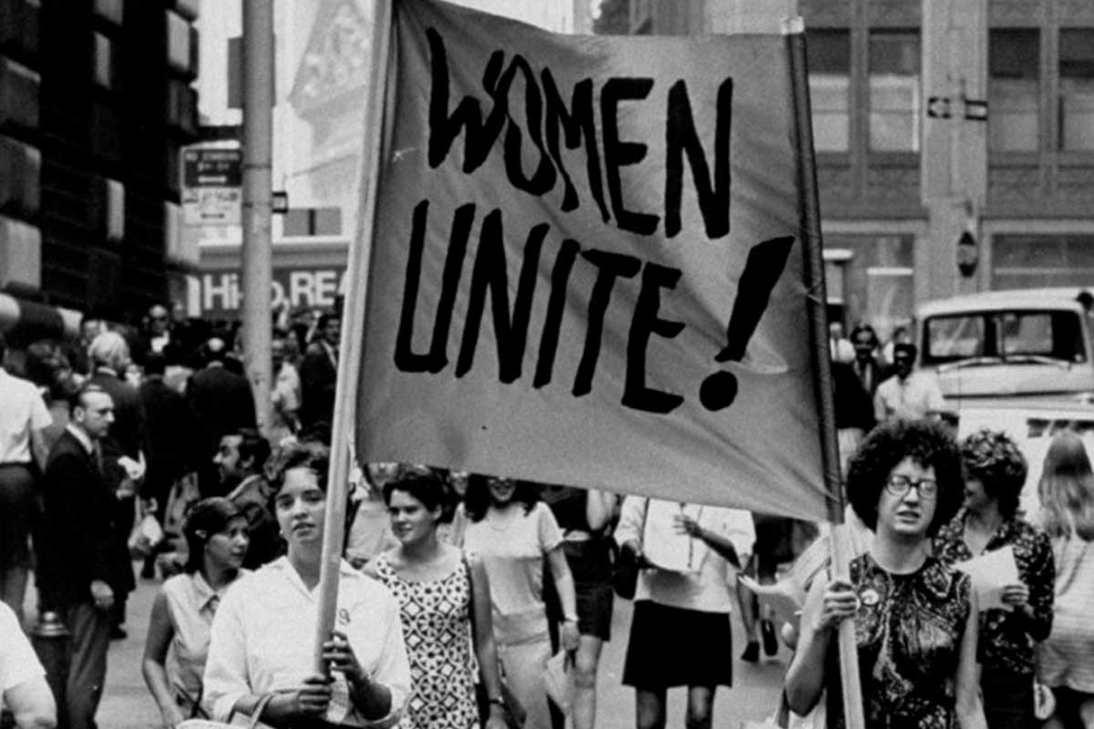 Il movimento femminista in una protesta tra gli anni ‘60 e ‘70 per l’uguaglianza legale e professionale, immagine markmanson Lampoon