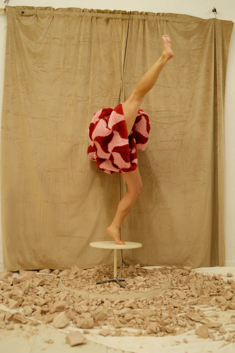 Full look Bottega Veneta. Photography and performance Isabelle Wenzel, fashion editing Arianna Bonifazi