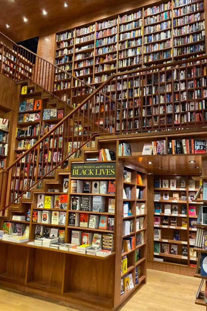 The floor-to-ceiling bookcase walls leading to the second floor, Downtown Brooklyn