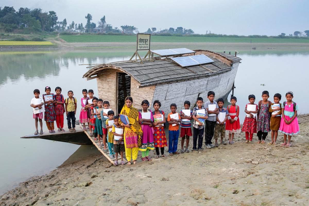 Lampoon boat school in bangladesh, a group of children outside their school abir abdullah, climate visuals countdown