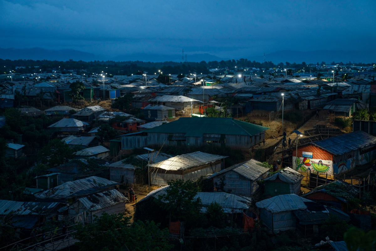 Lampoon solar street lights, view over rooftops at night in the refugee camps at cox's bazaar abir abdullah, climate visuals countdown