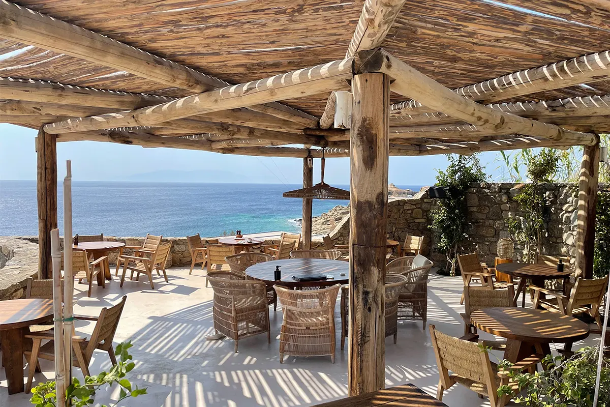 Soho Roc House, Mykonos, tables on the terrace