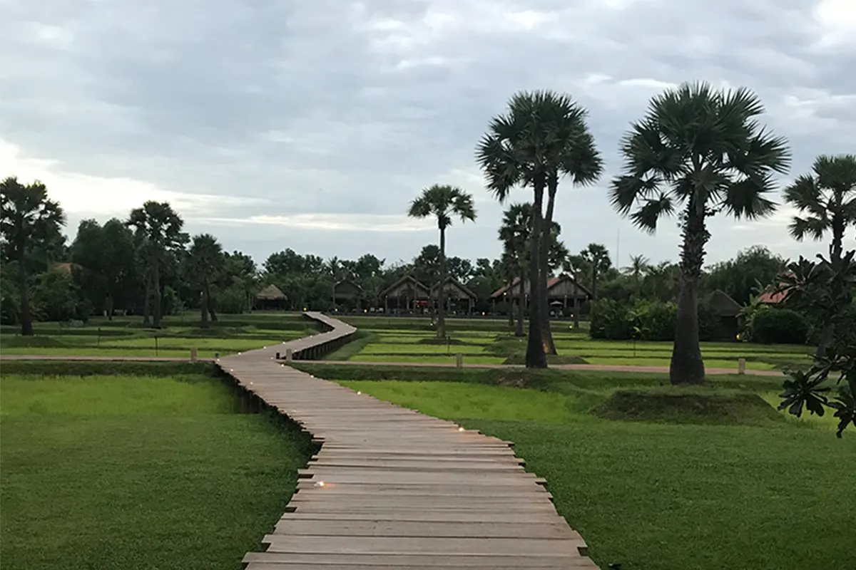 00 walkway between the meadows at Siem Reap Phum Baitang