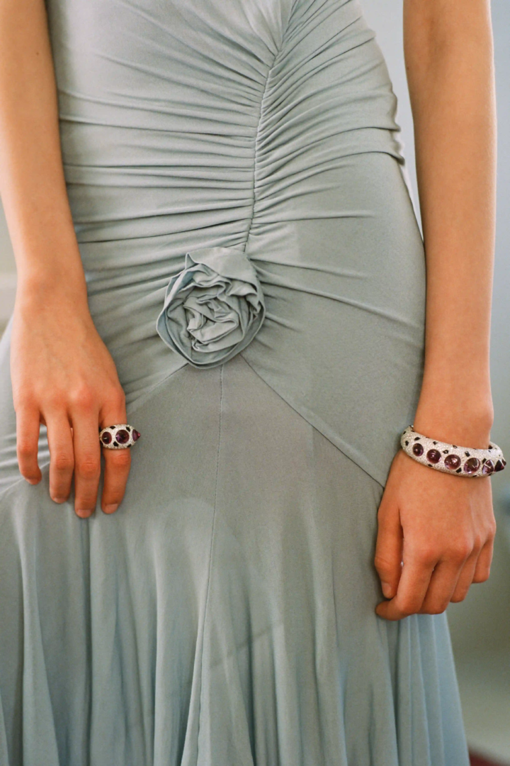 white-gold bracelet and ring with amethyst, onyx and diamonds CARTIER Clash Unlimited Collection dress BLUMARINE