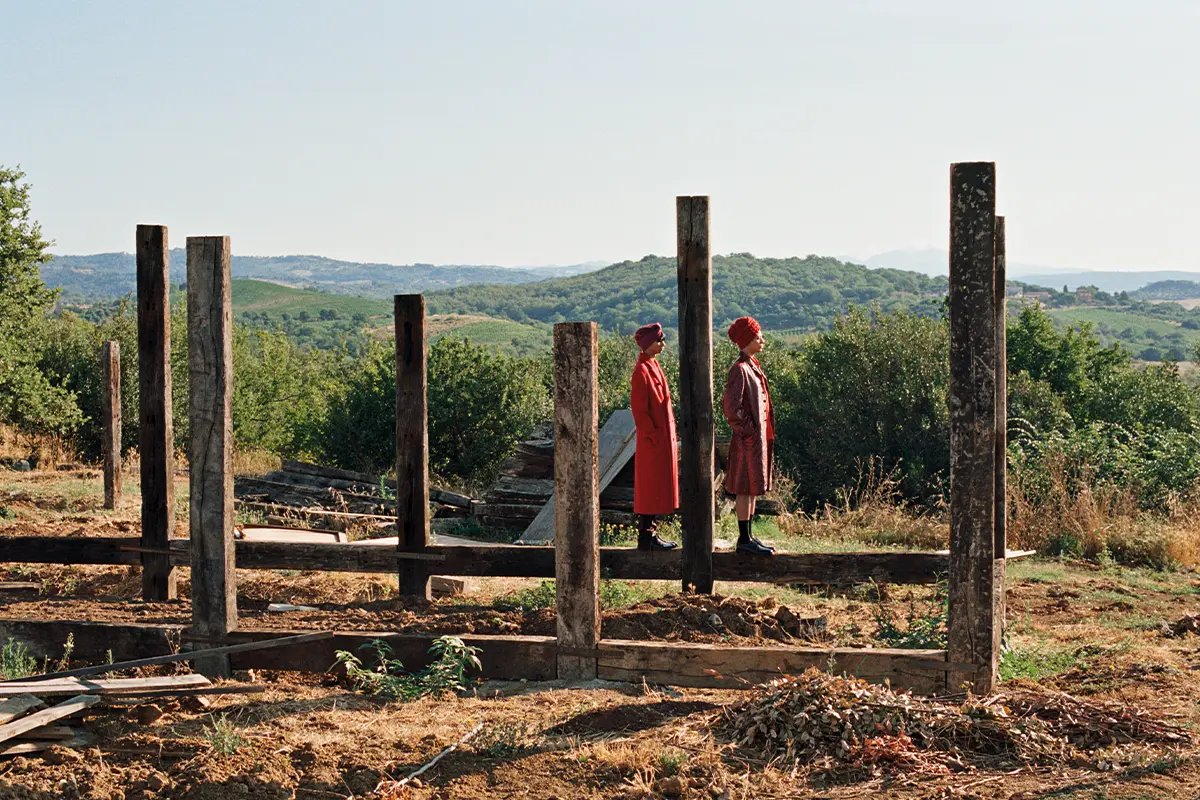 Rohan wears coat, pants and shoes BERLUTI, scarf FALIERO SARTI, Earl wears shirt and coat PAUL SMITH, socks GALLO, scarf FALIERO SARTI, shoes DIOR MEN. Photography Luke Wassmann