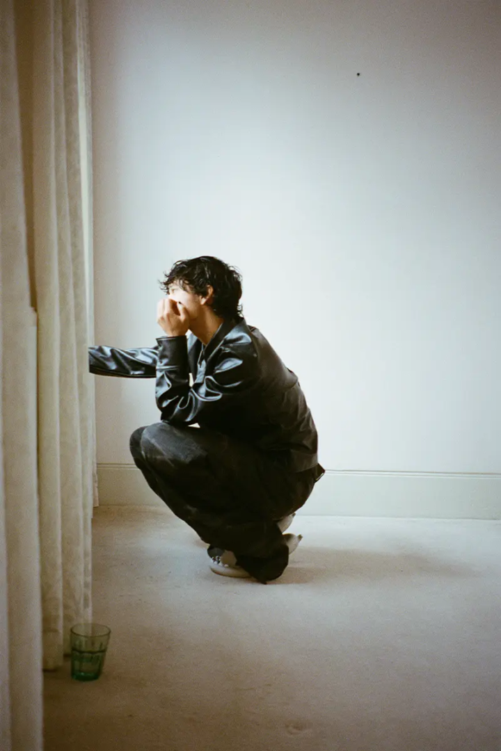 Tosh Basco wears jacket and pants MM6 Maison Margiela