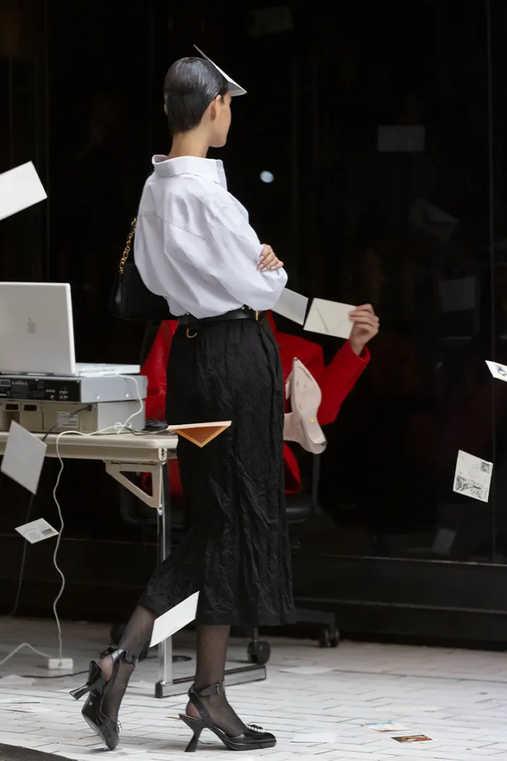 shirt, skirt, heels, bag, belt and tights Dior. Photography Winter Vandenbrink