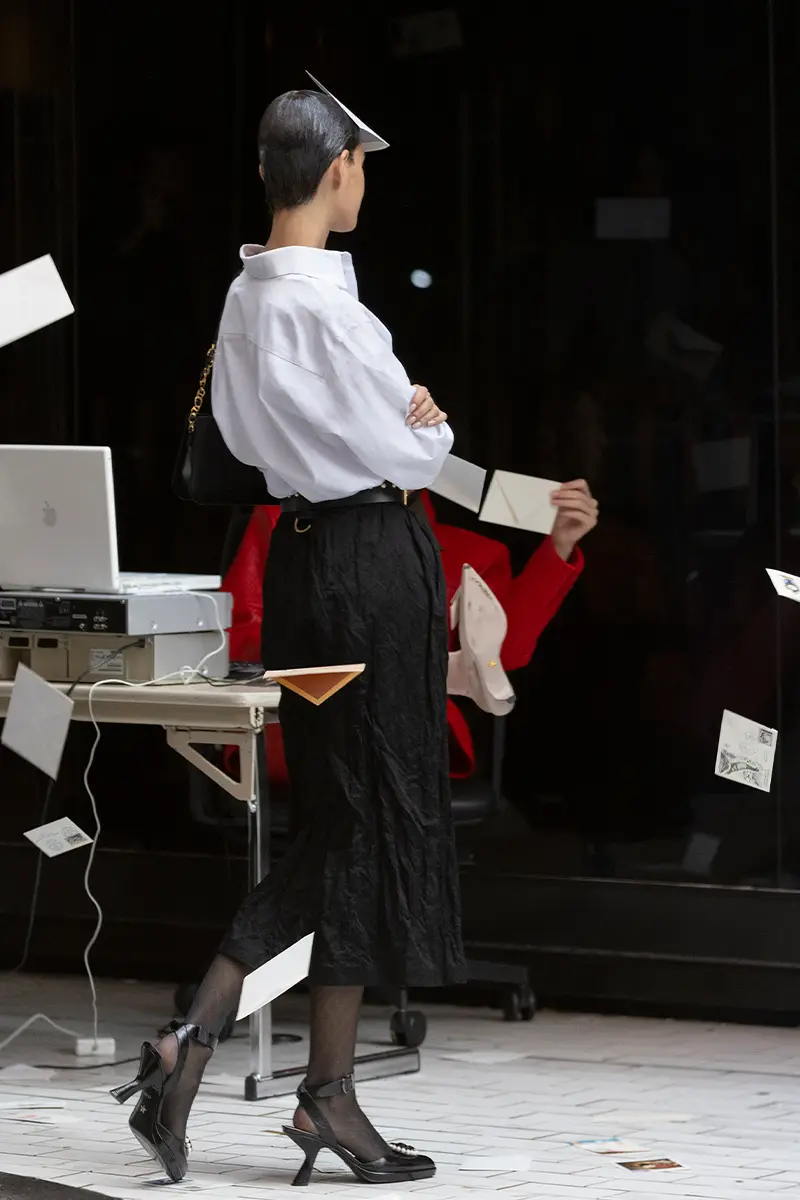 Lampoon, shirt, skirt, heels, bag, belt and tights Dior. Photography Winter Vandenbrink