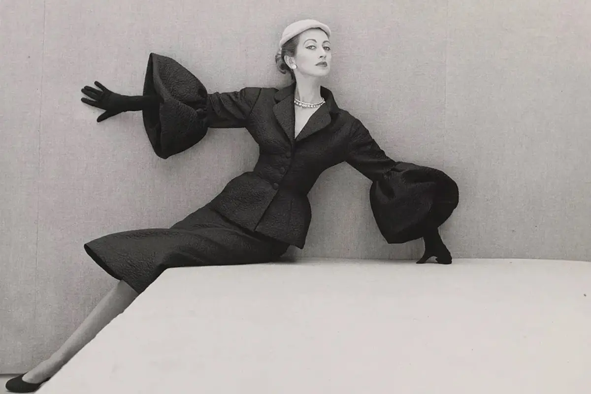 A model poses in a sharply elegant Cristóbal Balenciaga suit, 1951. Henry Clarke, Palais Galliera