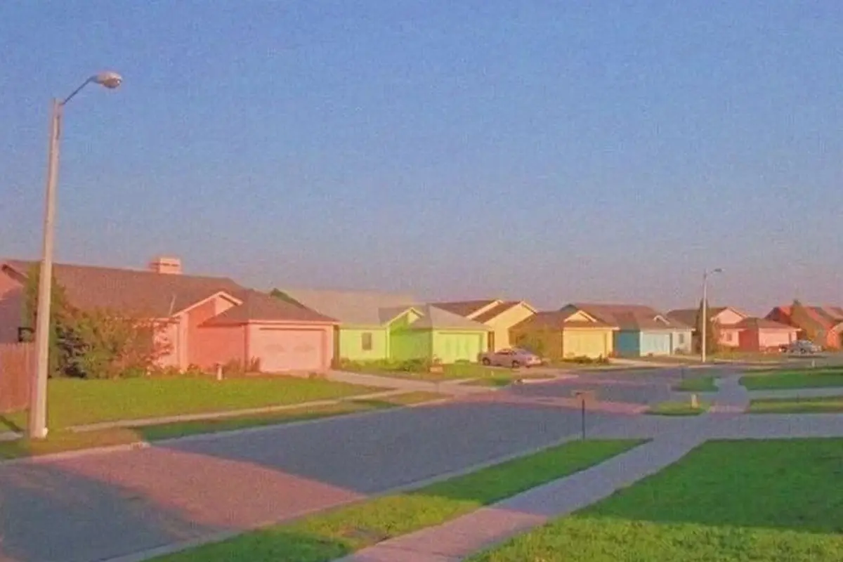 Dreamcore aesthetics – a typical American suburbs. It comes from a Tim Burton movie from 1990