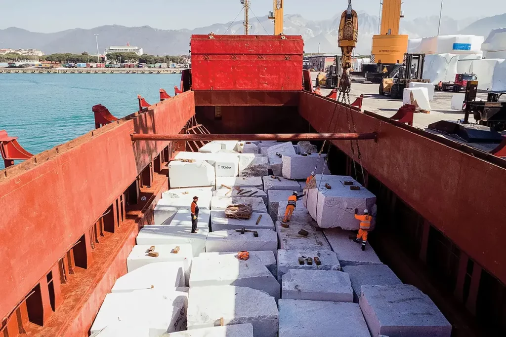 A cargo ship in the Carrara port carrying 106 marble blocks — in aggregate weighing something like 2,000 tons.Credit...Luca Locatelli_Institute, for The New York Times