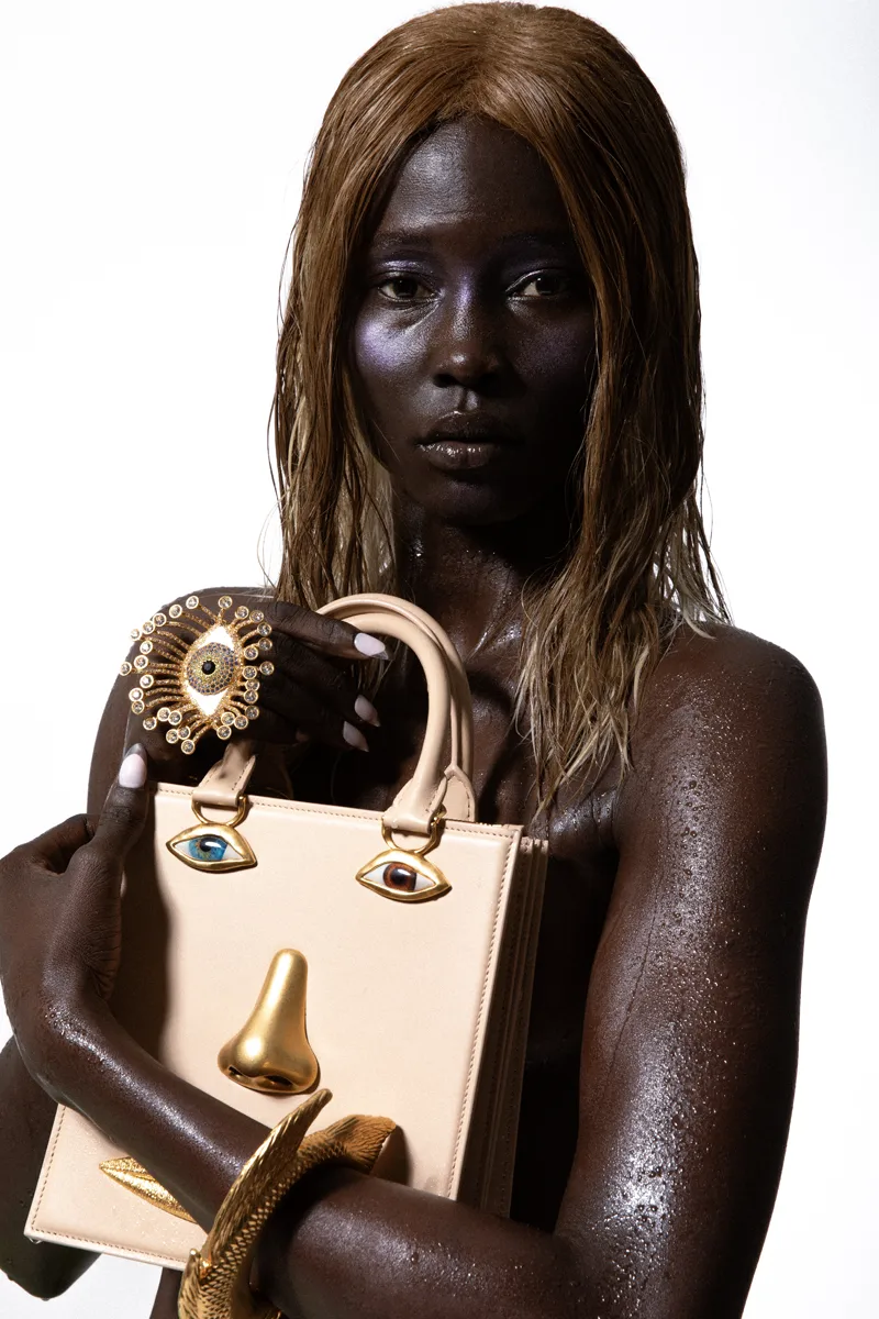 Bag and jewels Schiaparelli. Photography Bryan Torres, styling Oliver Johnstone