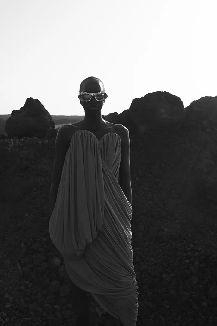 Dress Loewe, sunglasses Ottolinger. Photography Jelka von Langen and Roman Goebel, styling Niki Pauls