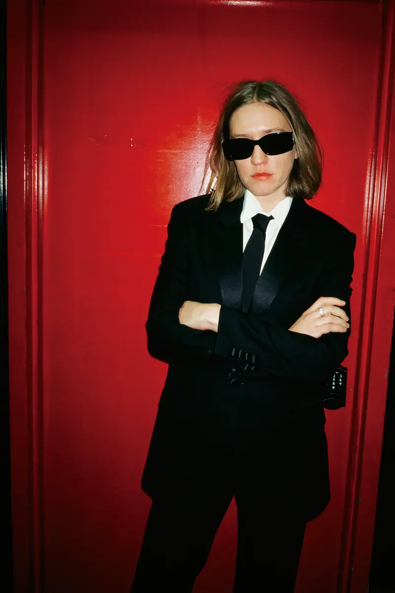 Gordon Moore wearing suit and sunglasses Celine by Hedi Slimane. Photography Jiro Konami, styling Caitlan Hickey