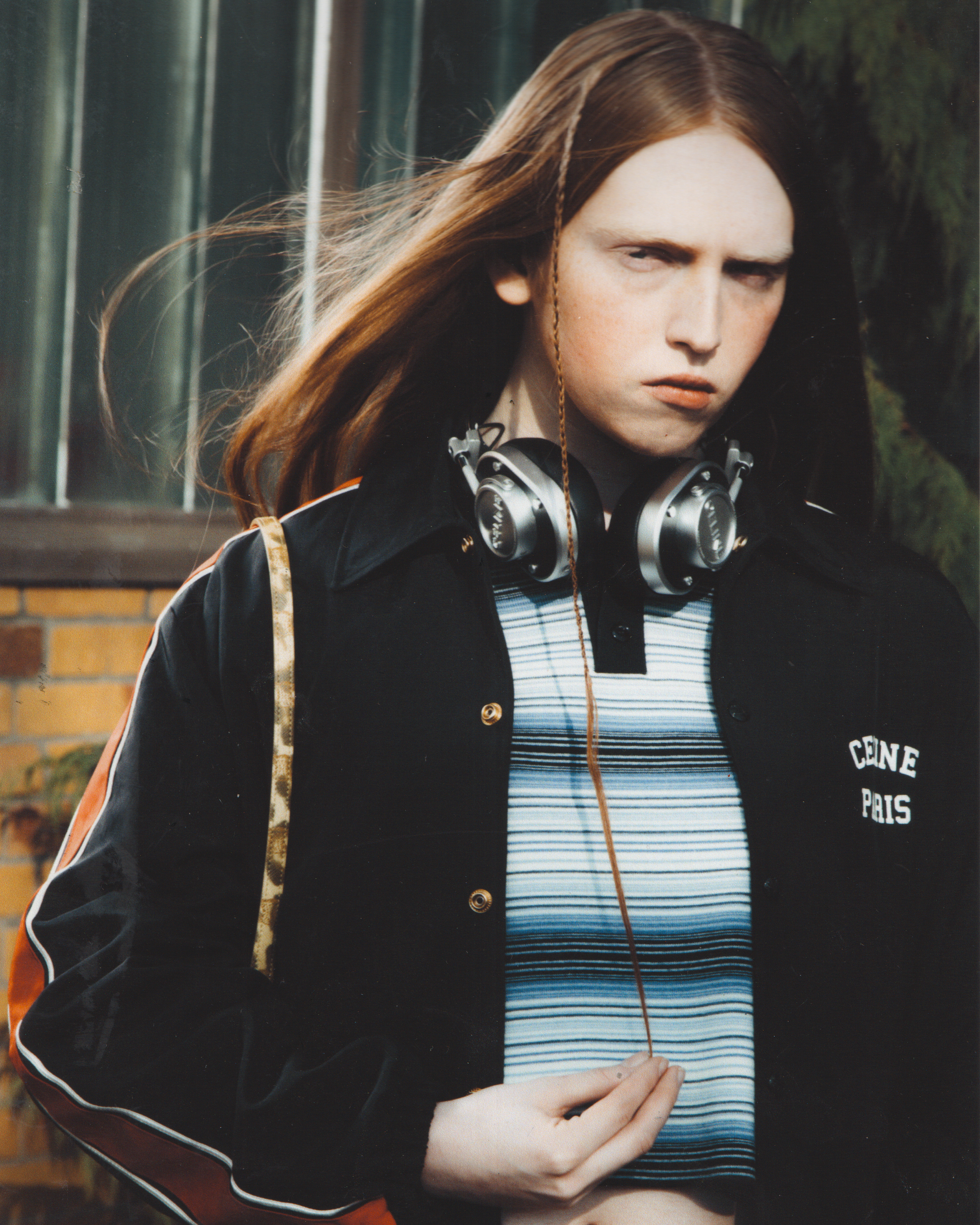 Ivy wearing jacket, polo shirt, headphones, bag Celine by Hedi Slimane, photographer Jan Philipzen, stylist Ina Witzel