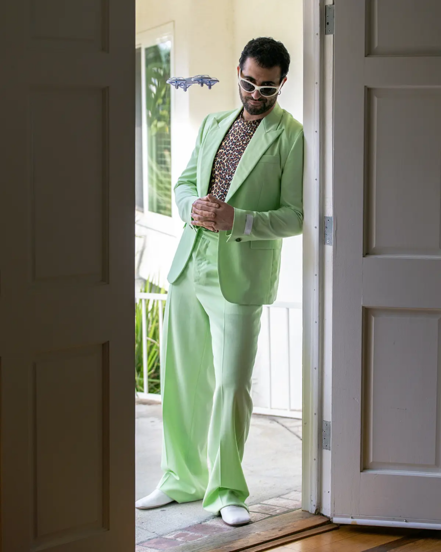 Jordan wears suit Versace, top Palace Costume, shoes JacquemusxRepetto, sunglasses Crap Eyewear