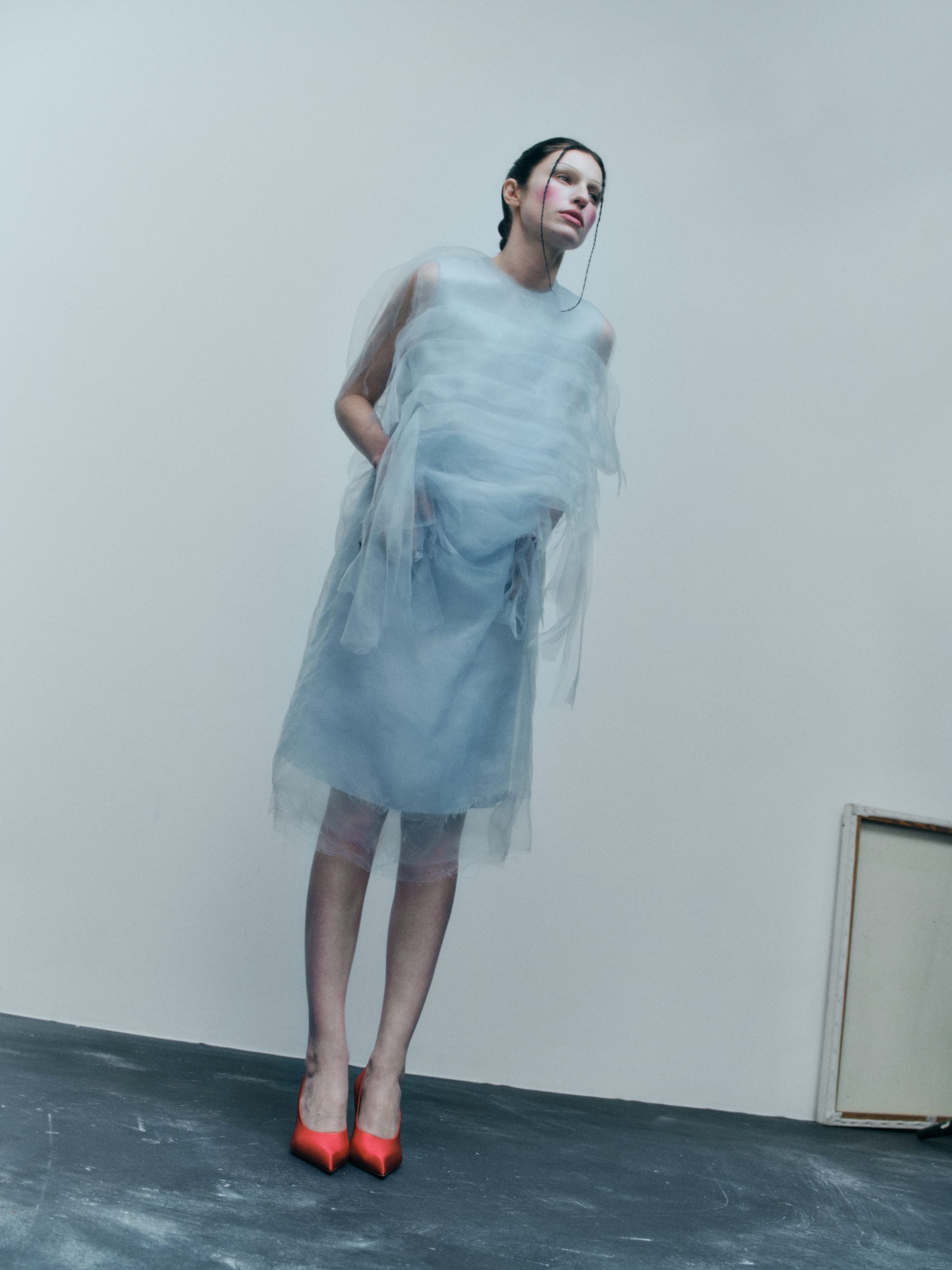 Tali wears dress and heels Prada. Photography Olivia Malone, styling Carolina Orrico