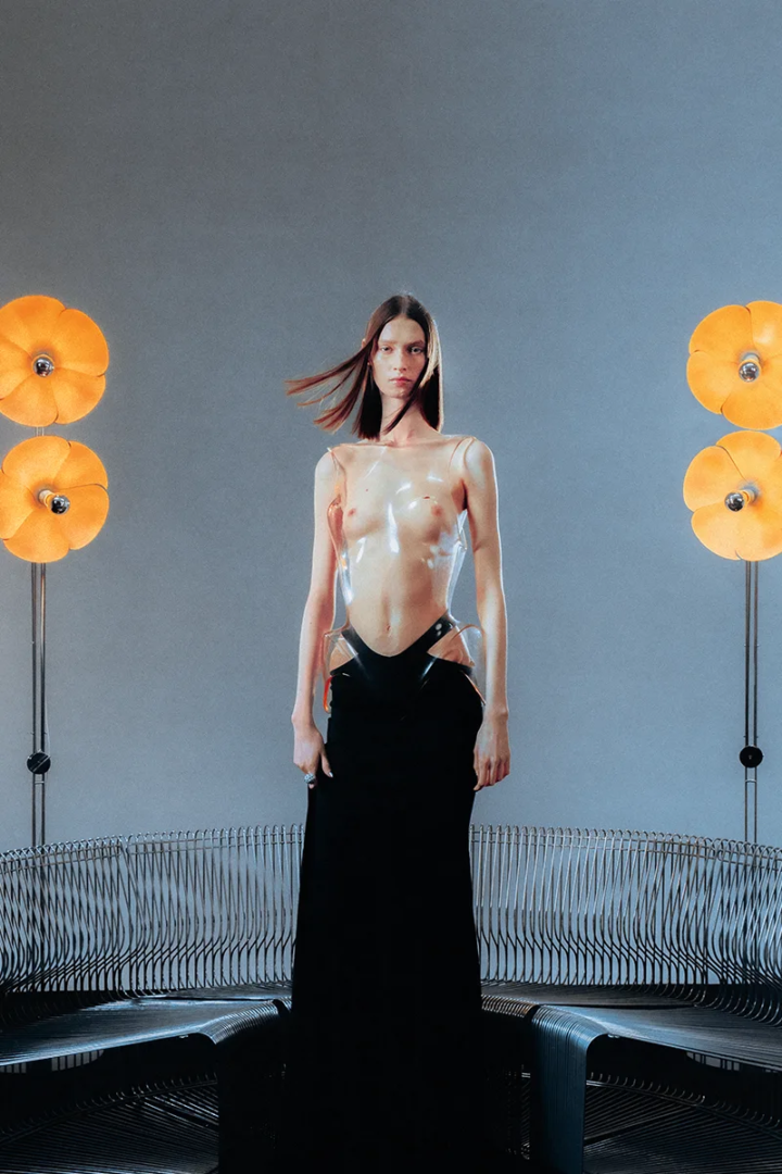 Top, skirt and heels Mugler, ring Cartier. Photography Jeremy Soma.