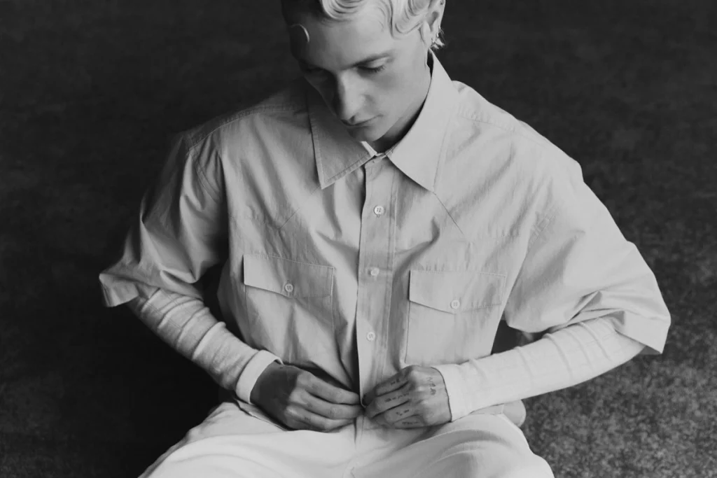 Shirt and pants Third Way, long sleeve undershirt Charlie Beads. Photography Emilia Staugaard, styling Yuval Ozery