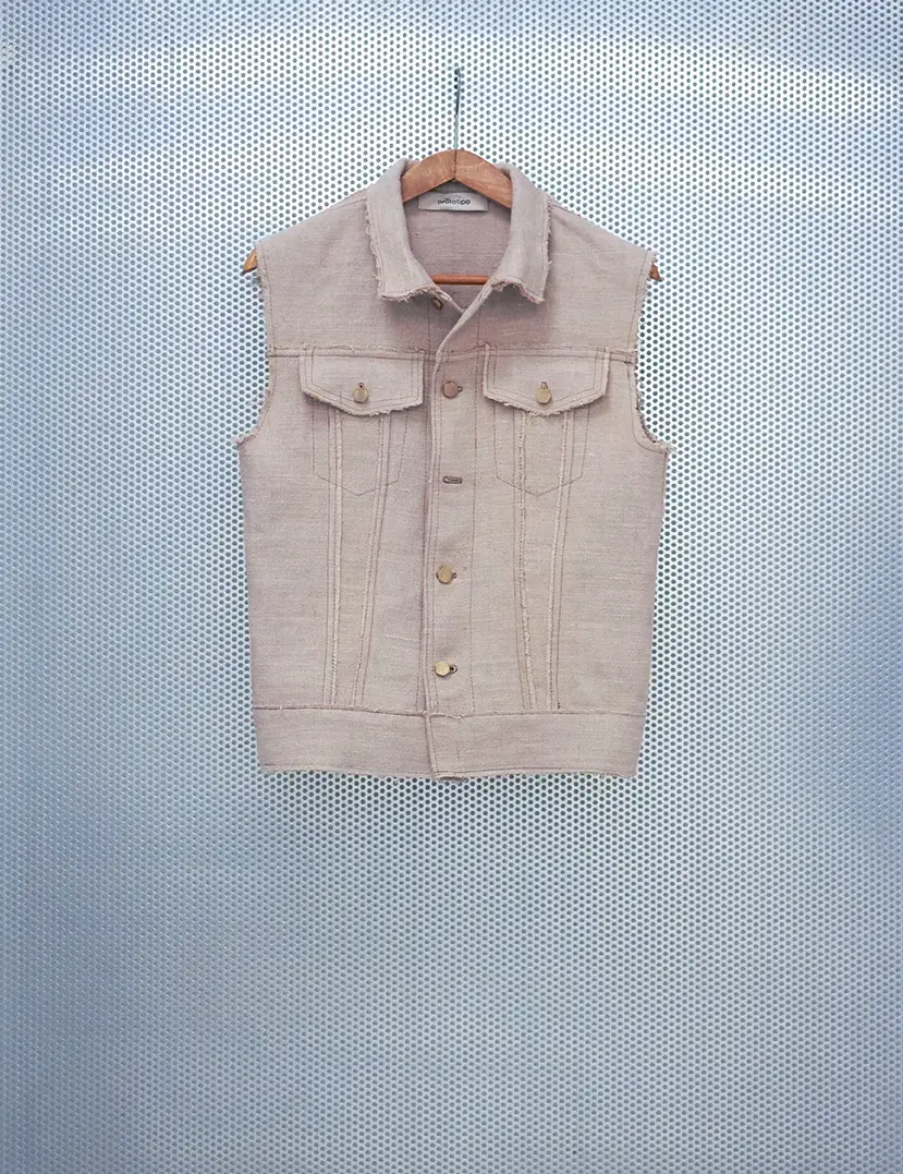 PRT.060.101 Doubled hemp denim vest, a unique piece crafted with doubled hemp fabric to achieve a substantial weight and vintage-inspired texture, with its raw seams and panel construction 