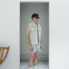 PRT.060.301 Handwoven Hemp Vest with Canvas Details and Brass Buttons Model Shooting Diagonal