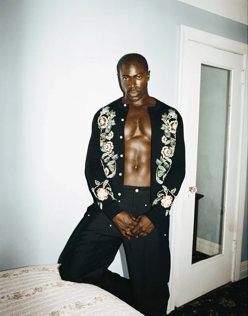 Moses wearing carding and pants Louis Vuitton. Photography Lauren Withrow, styling Kirby Marzec