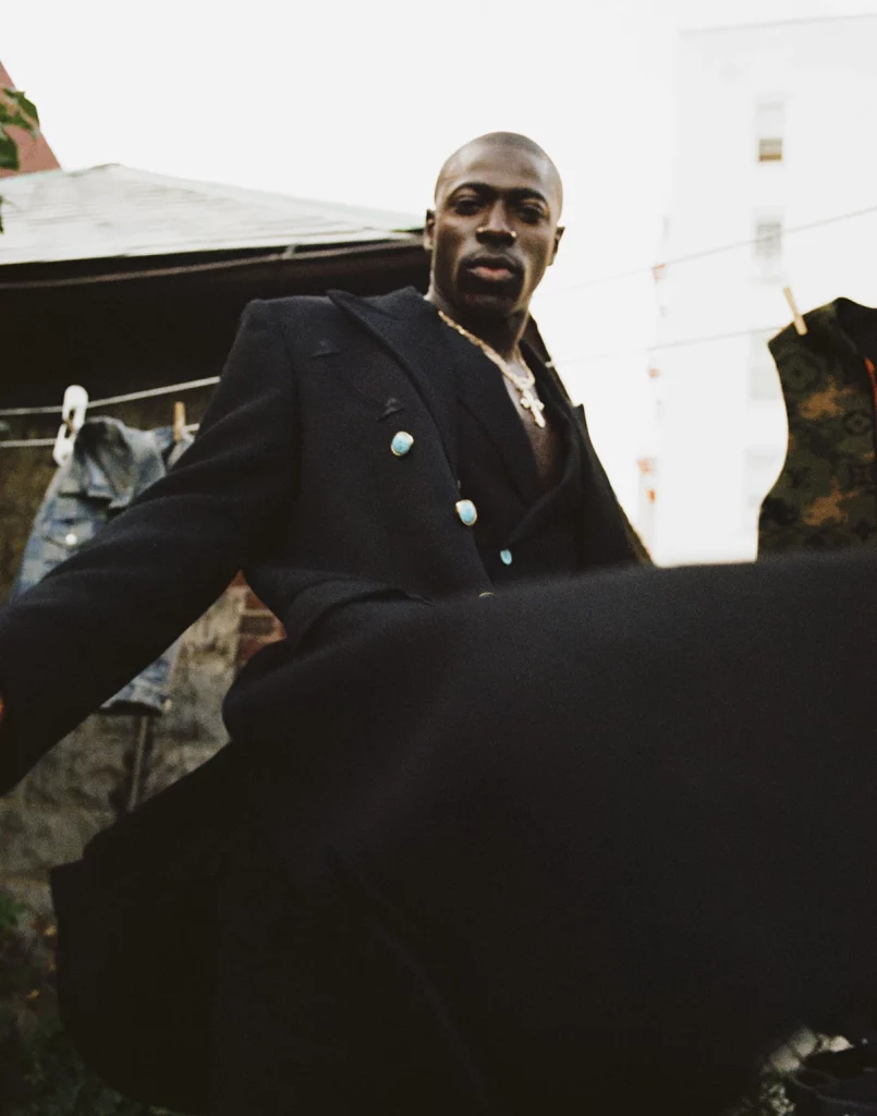 Moses wears Louis Vuitton Fall 24_25. Photography Lauren Withrow, styling Kirby Marzec