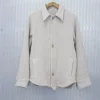 041.060 - Crafted in Italy this Handwoven Hemp Shirt features a relaxed fit, raglan sleeves, and a wide collar. Out of Hemp, Silk and Linen textile