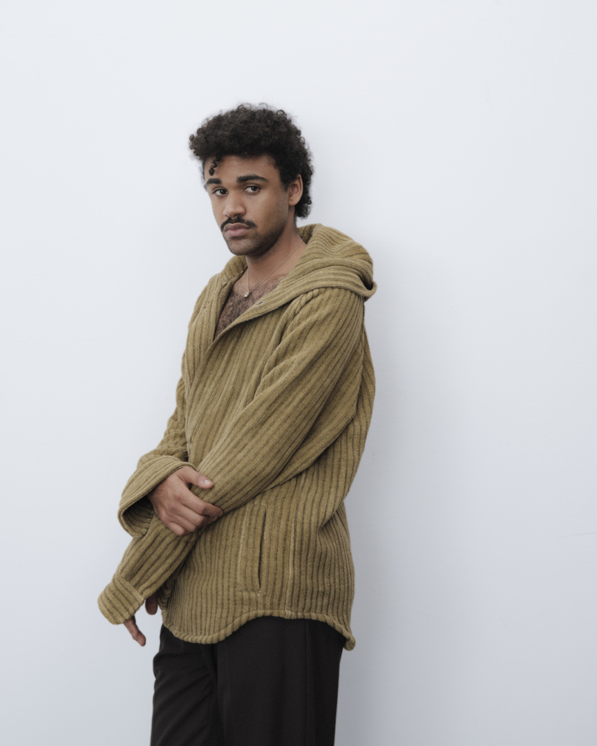Langston Uibel wears hamp hooded sweater Prototipo Studio
