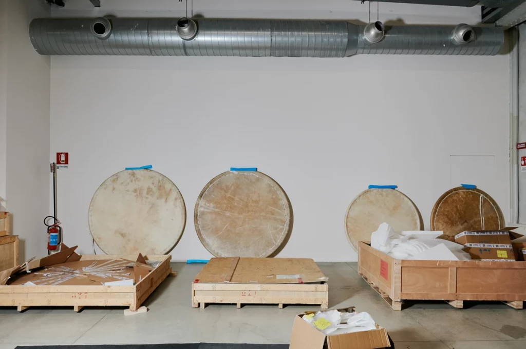 Cover Setup in the days prior to the opening. Tarek Atoui, making of the exhibition _Improvisation in 10 Days_, Pirelli HangarBicocca, Milan, 2025. Courtesy the artist and Pirelli HangarBicocca, Milan. Photo Francesco Margaroli