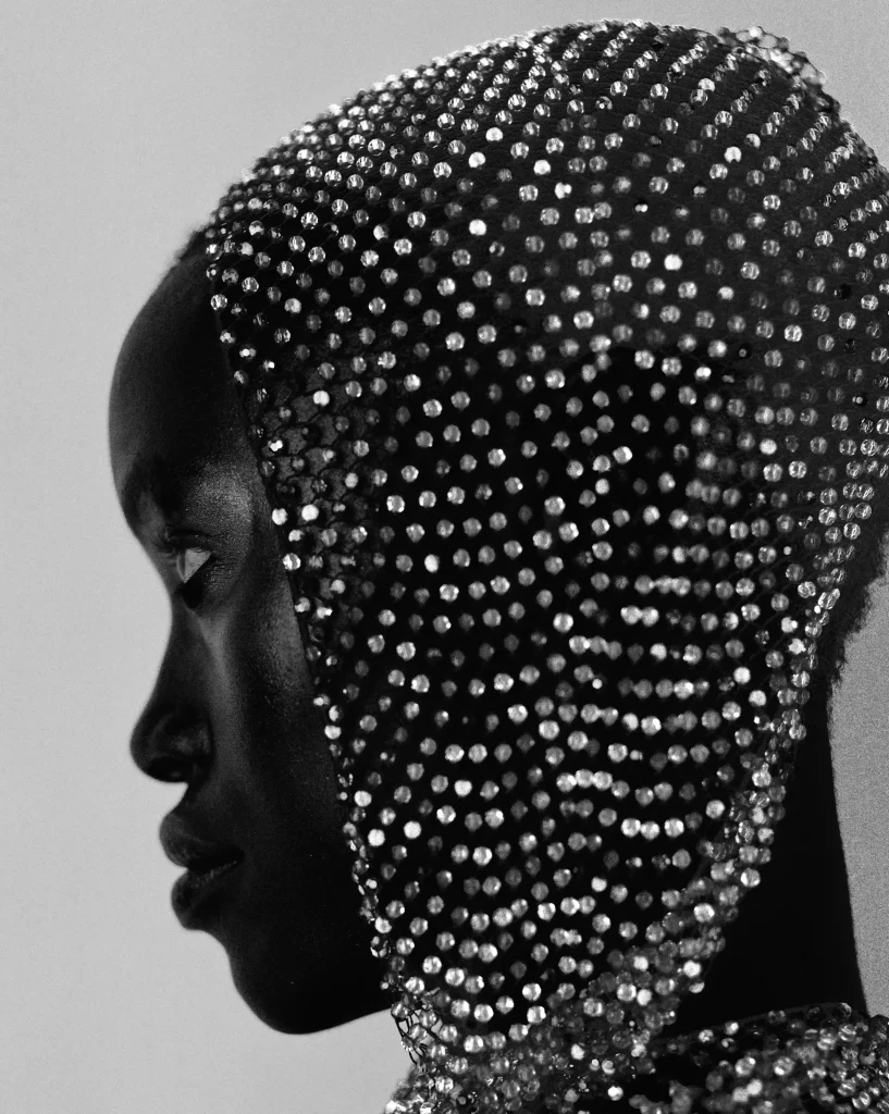 Nondi wears vintage beaded scarf. Photography Elie Benistant, styling Peter Georgiades
