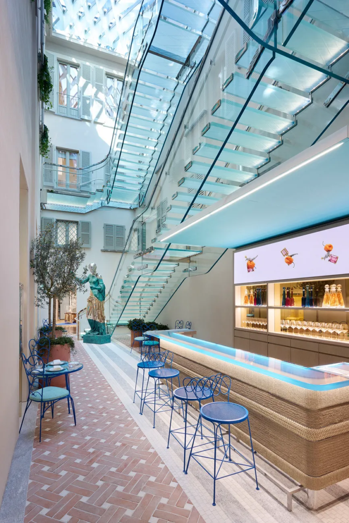 Tiffany & Co.’s store in Via Montenapoleone, the glass staircase conceived by Peter Marino