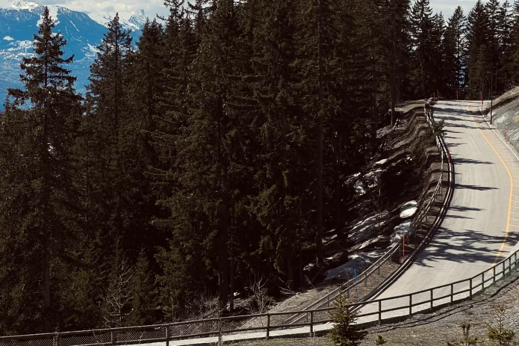 The road descending to the Six Senses Crans-Montana