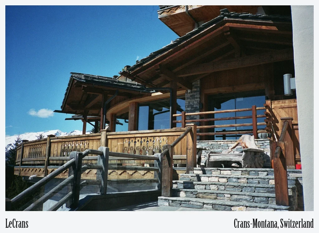 LeCrans, Crans-Montana — grand timber façade and stone steps