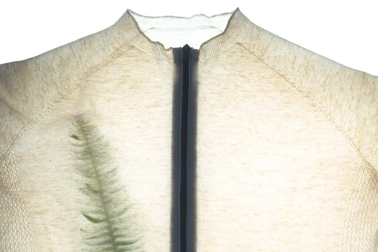 COVER First cycora® Jersey||Cycora® for GANNI jersey|From the laboratory|Reintegration|Regenerated Pellets|Shredder|Beaker|Yarn Spinning