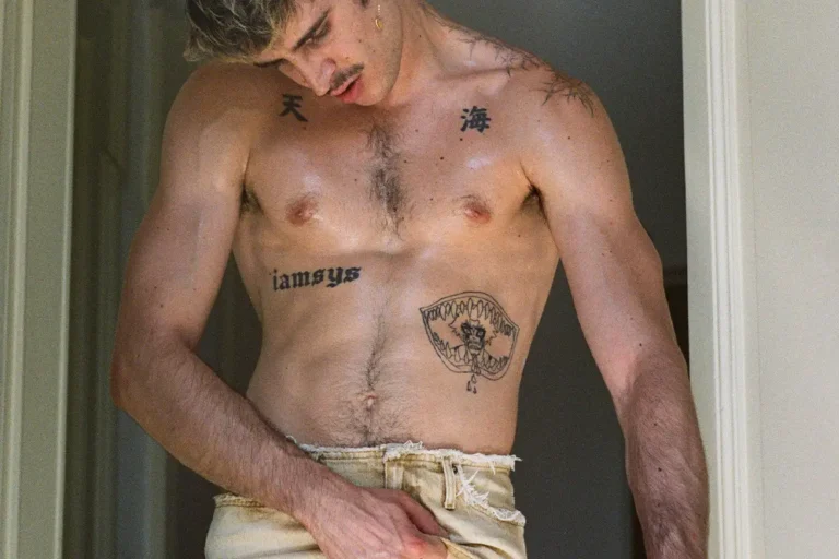 Lampoon Giovanni wearing denim skirt Diesel.Photography Gianmarco Onofri