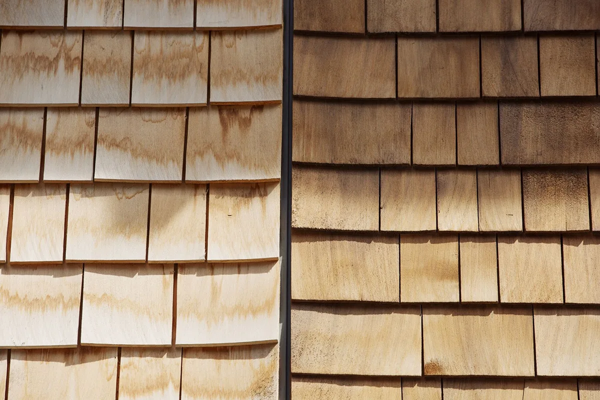 Cedar shingles on the exterior reinterpret the brick and stucco facades of older Stockholm buildings. The apartments were designed by General Architecture.Photographer- Erika Gerdemark