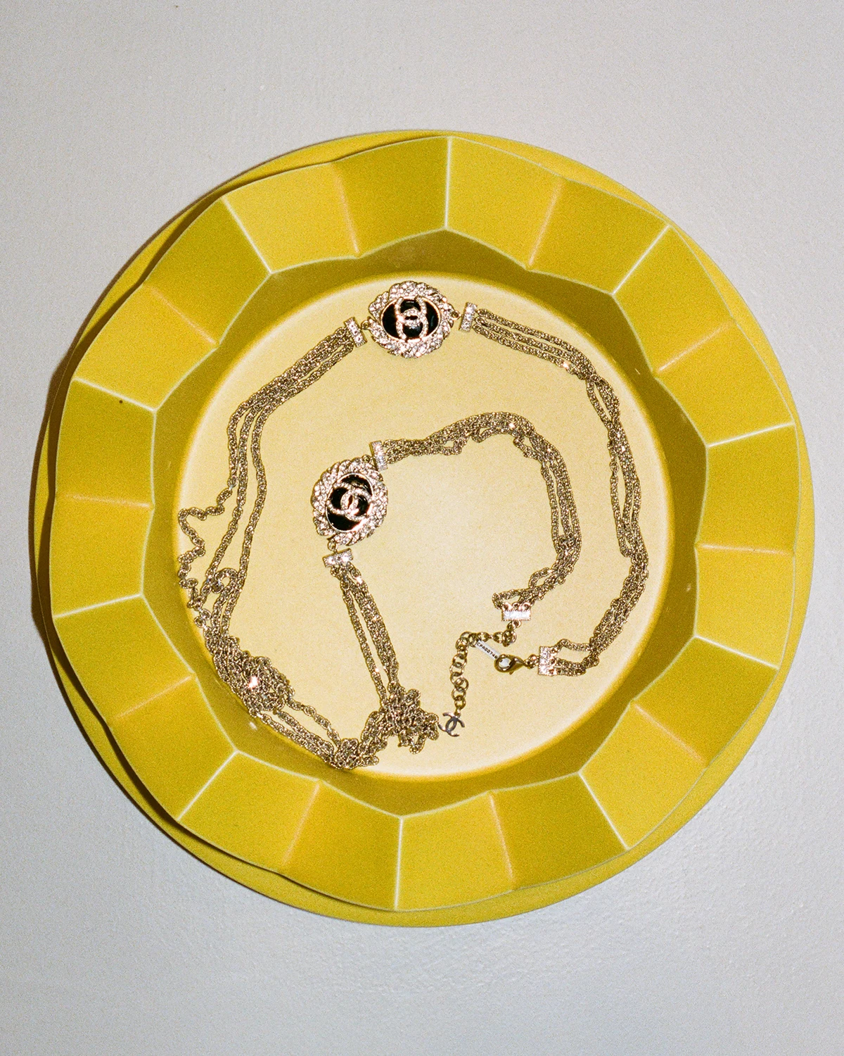 Chanel neckalce. Maria Porro, tray at the showroom. Photography Alessandro Timpanaro