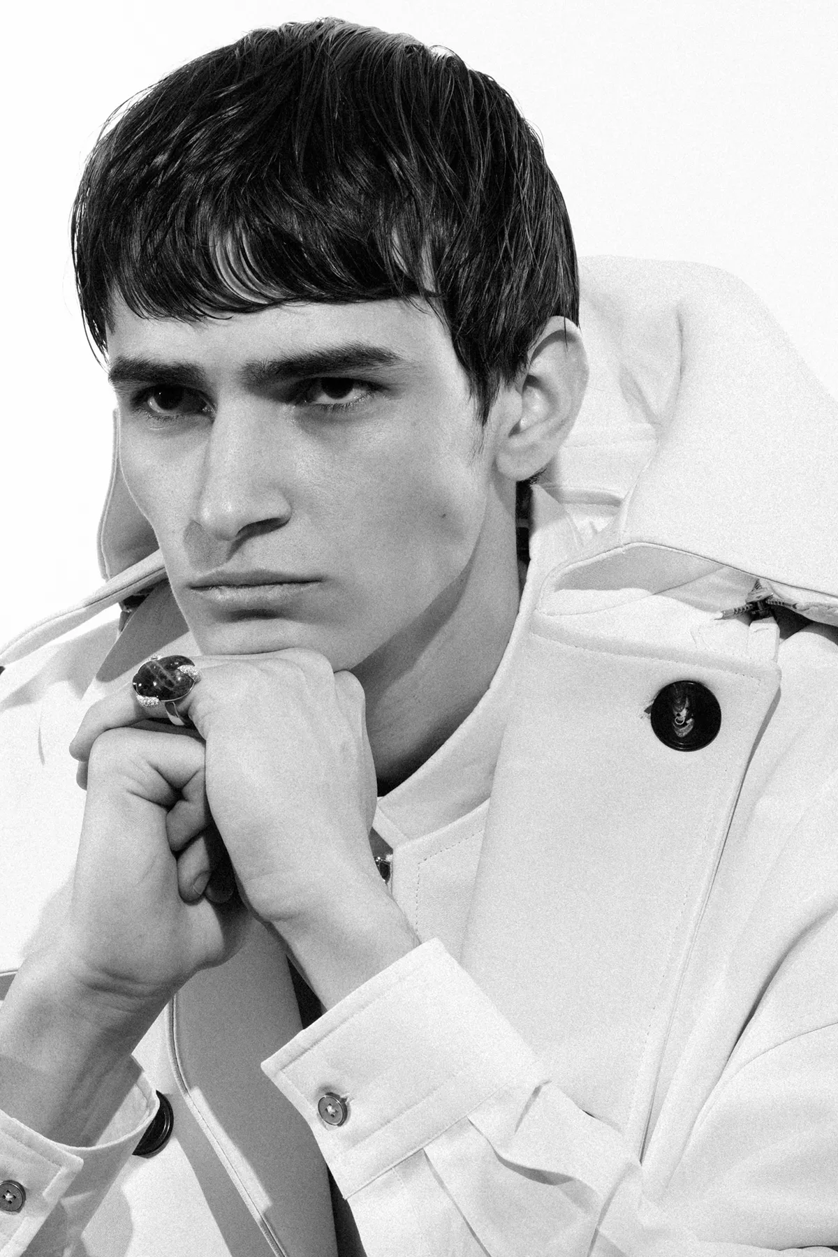 Coat, vest and shirt Emporio Armani, ring Pomellato Scarabeo collection