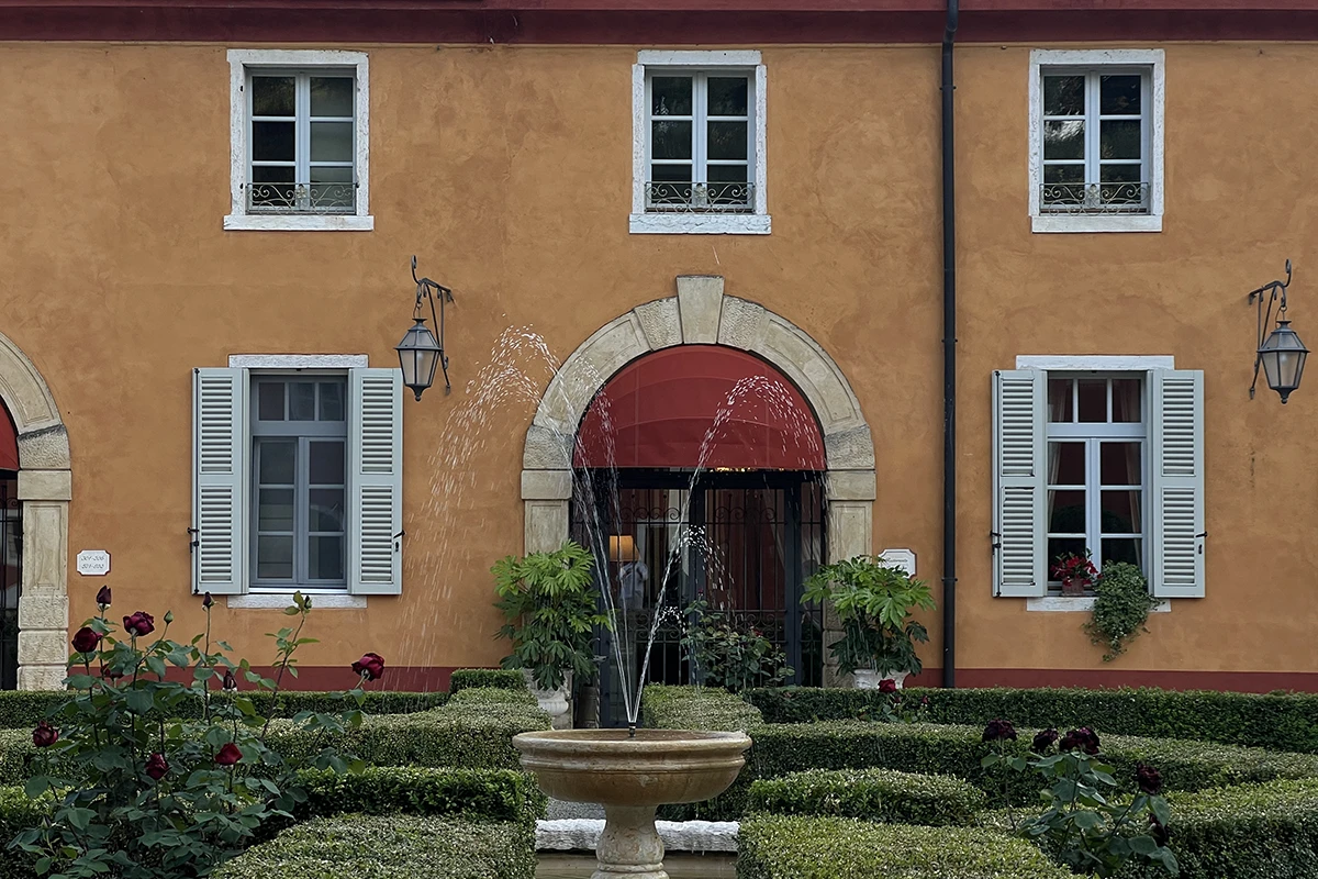 Courtyard with fountain and red canopy