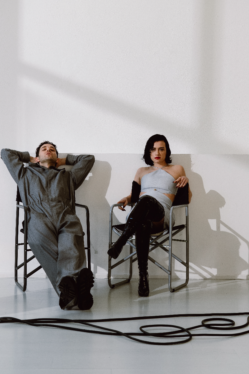 Dario Wears Suit Moschino, Shoes Sergio Rossi _ Veronican Wears Dress Philosophy By Lorenzo Serafini, Shoes Le Silla. Photography Andrea Ariano, Styling Lorenzo Oddo