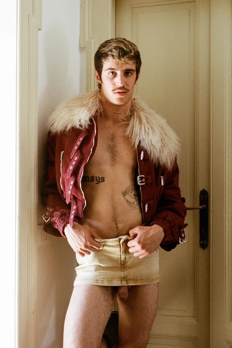 Giovanni wears jacket Blumarina, denim skirt Diesel.Photography Gianmarco Onofri, styling Christian Stemmler