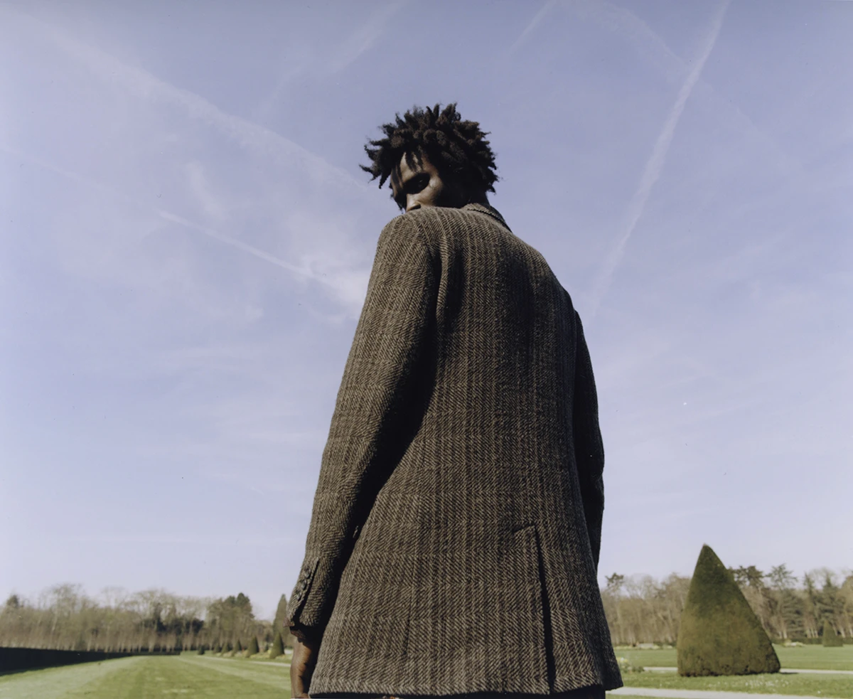 Jacket Yohji Yamamoto. Photography Kevin Felicianne, styling Iggy Nko