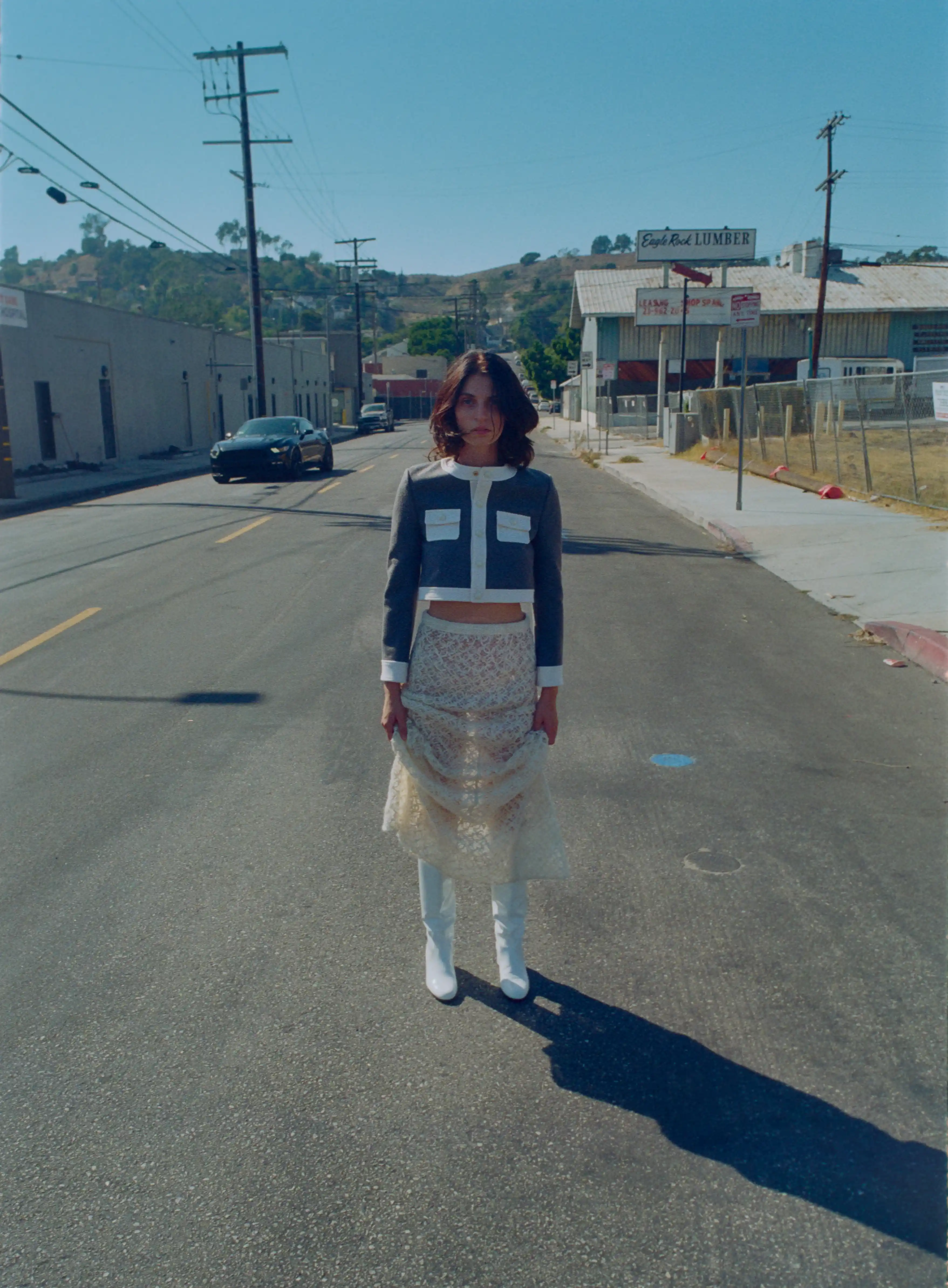 Jacket and boots Celine, skirt Chanel. Photography Rupert Tapper, styling Gemma Ferri