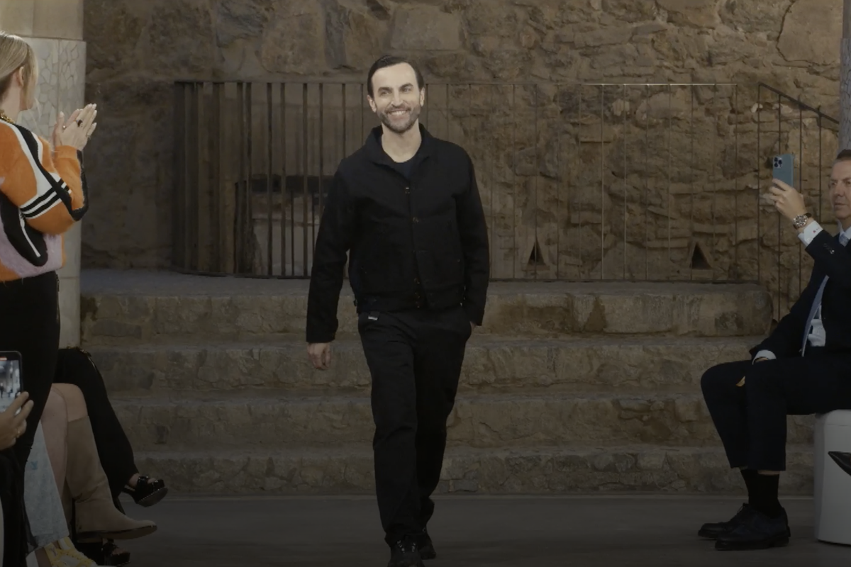 Nicolas Ghesquière walking down stairs at the Louis Vuitton Cruise 2025 in Barcelona