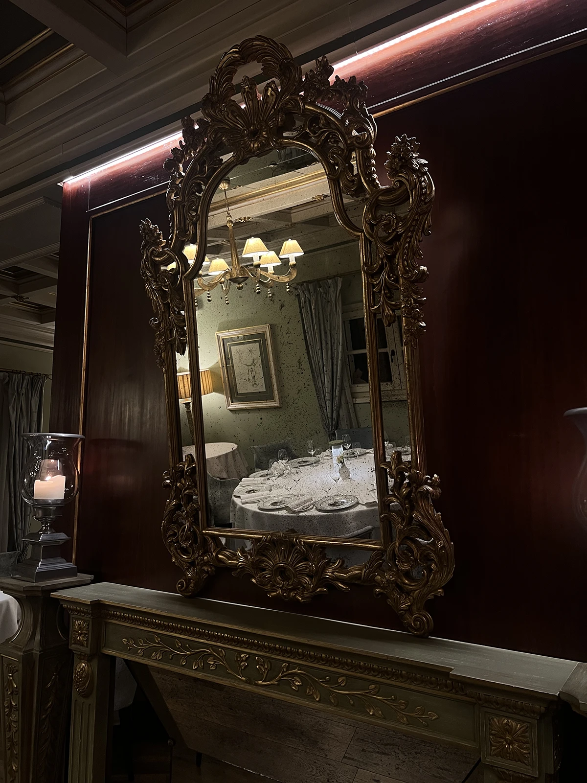 Mirror and chandelier in suite