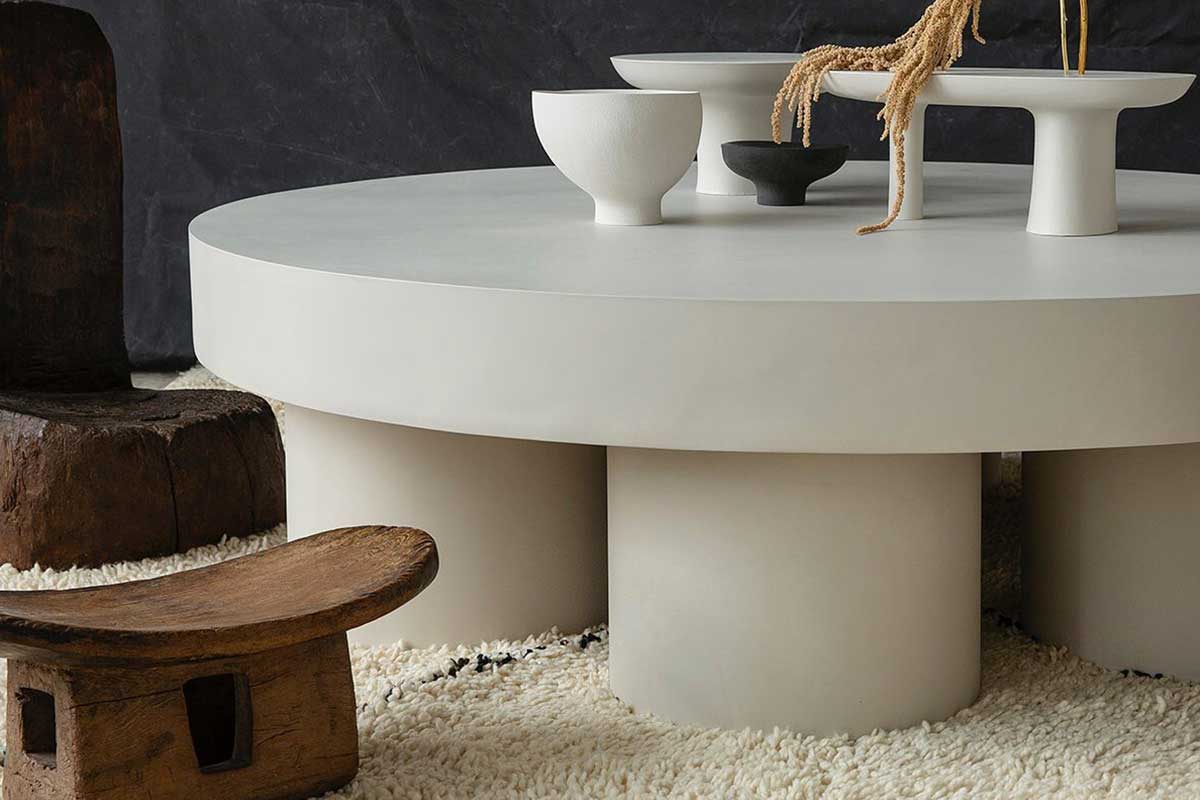 The New Craftsmen: A collection of Jesmomite bowls on a Pilotis Low Table by artist and designer, Malgorzata Bany