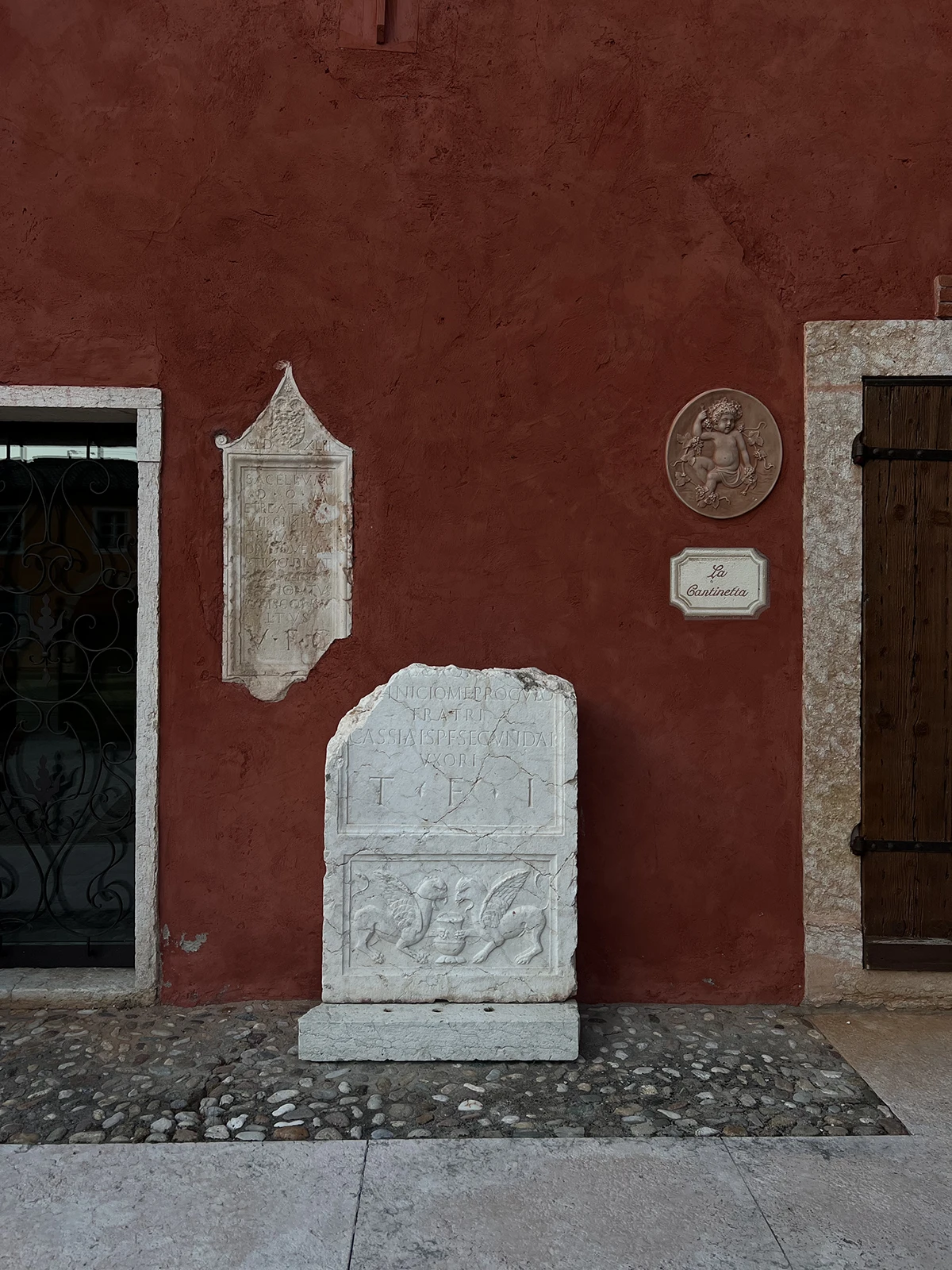 Old plaster wall with faded signs